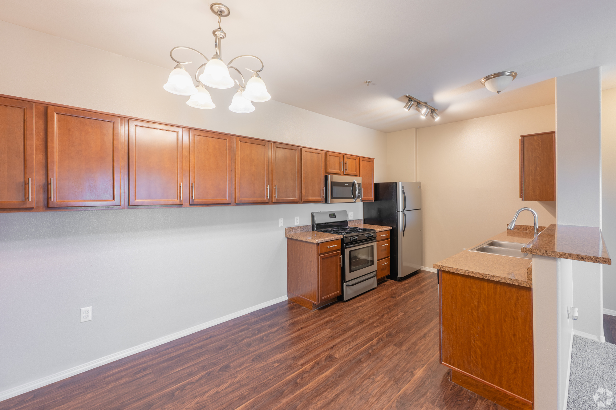 Inspirado Residences, apartment dining area and kitchen